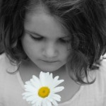 Girl with daisy